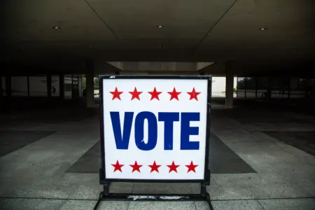 a-vote-sign-sits-outside-election-poll-at-the-lyndon-b-johnson-presidential-library-and-museum-durin