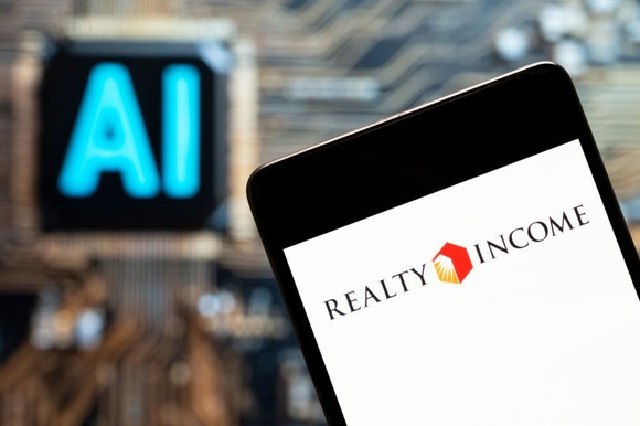 op-resize-url-https-g-foolcdn-com-editorial-images-841271-realty-income-logo-on-smartphone-ai-o-larg