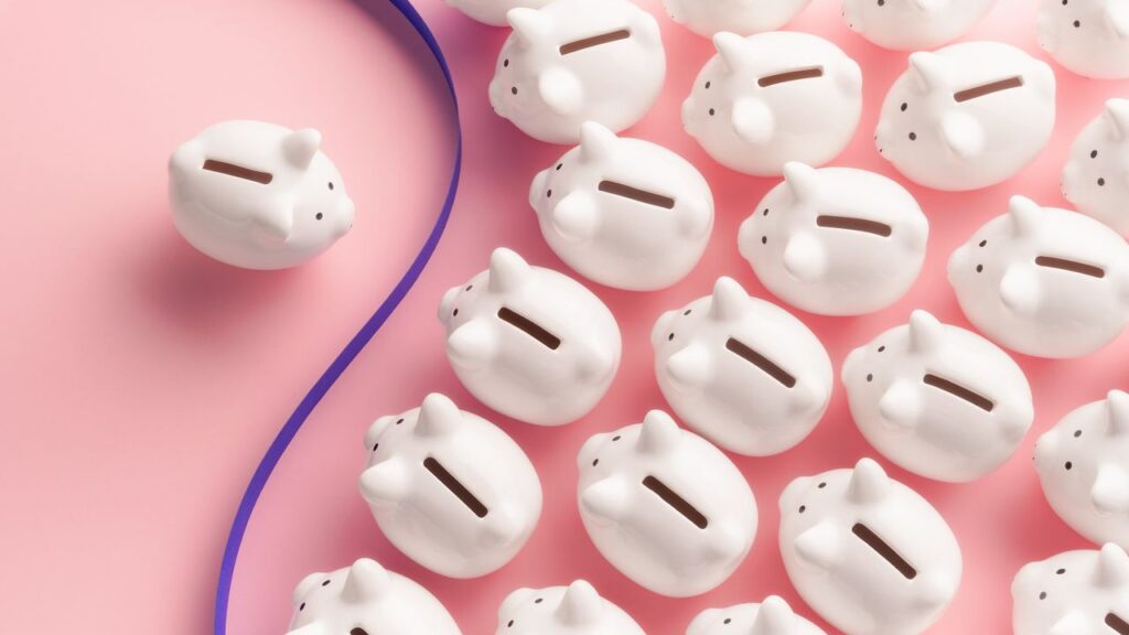 Piggy bank separated from the crowd